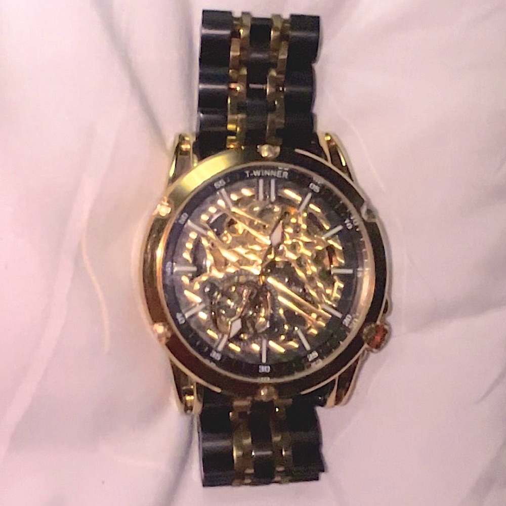 Men’s but links removed to fit 7 1/2 inch wrist unisex watch made by Forsining